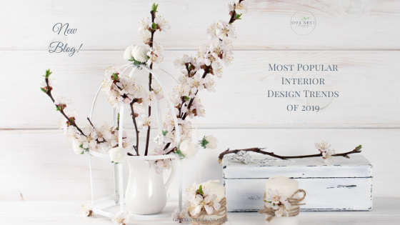 Blog Banner for Interior Decorating Trends of 2019 Featuring cotton flowers and ceramic vases.